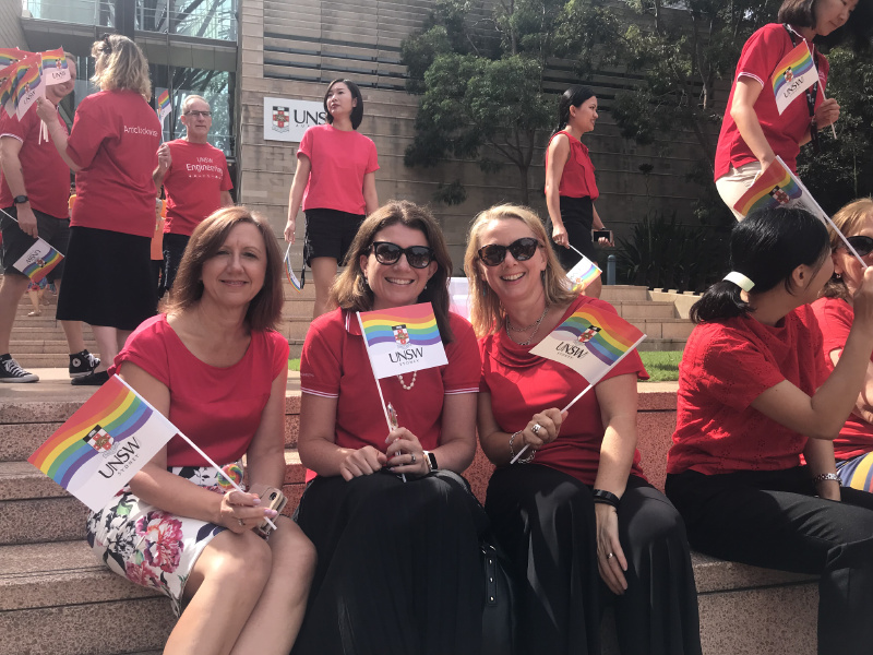 Lucy Marshall (middle) representing the faculty in red at the UNSW Human Rainbow event