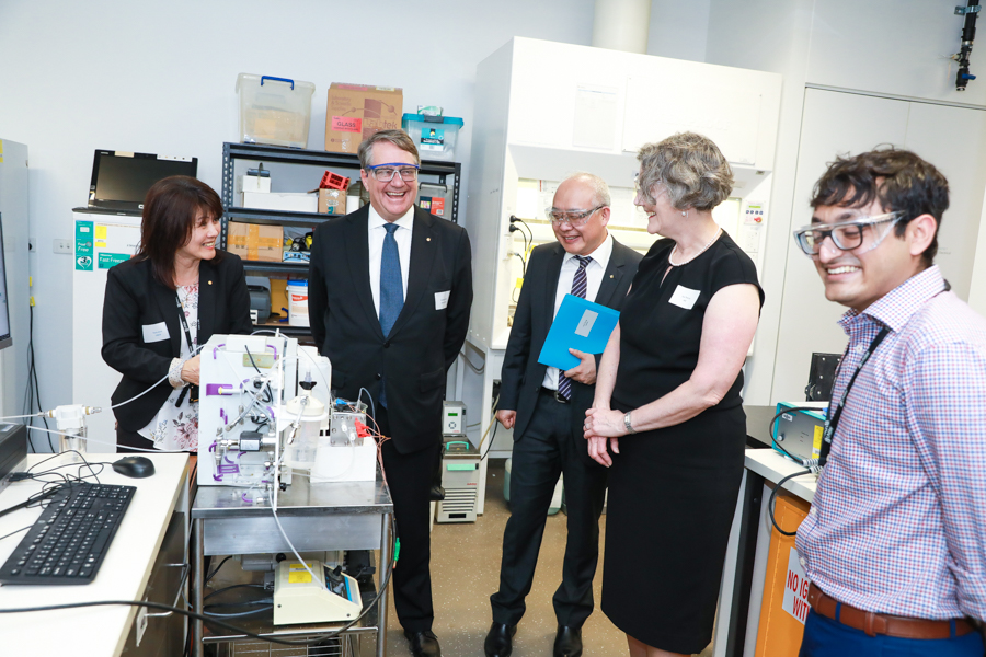 Scientia Professor Rose Amal, The Hon. Warwick Smith, Professor Joe Dong, Australian Research Council CEO Professor Sue Thomas and Dr Daiyan Rahman taking part in the Particles and Catalysis Lab tour.