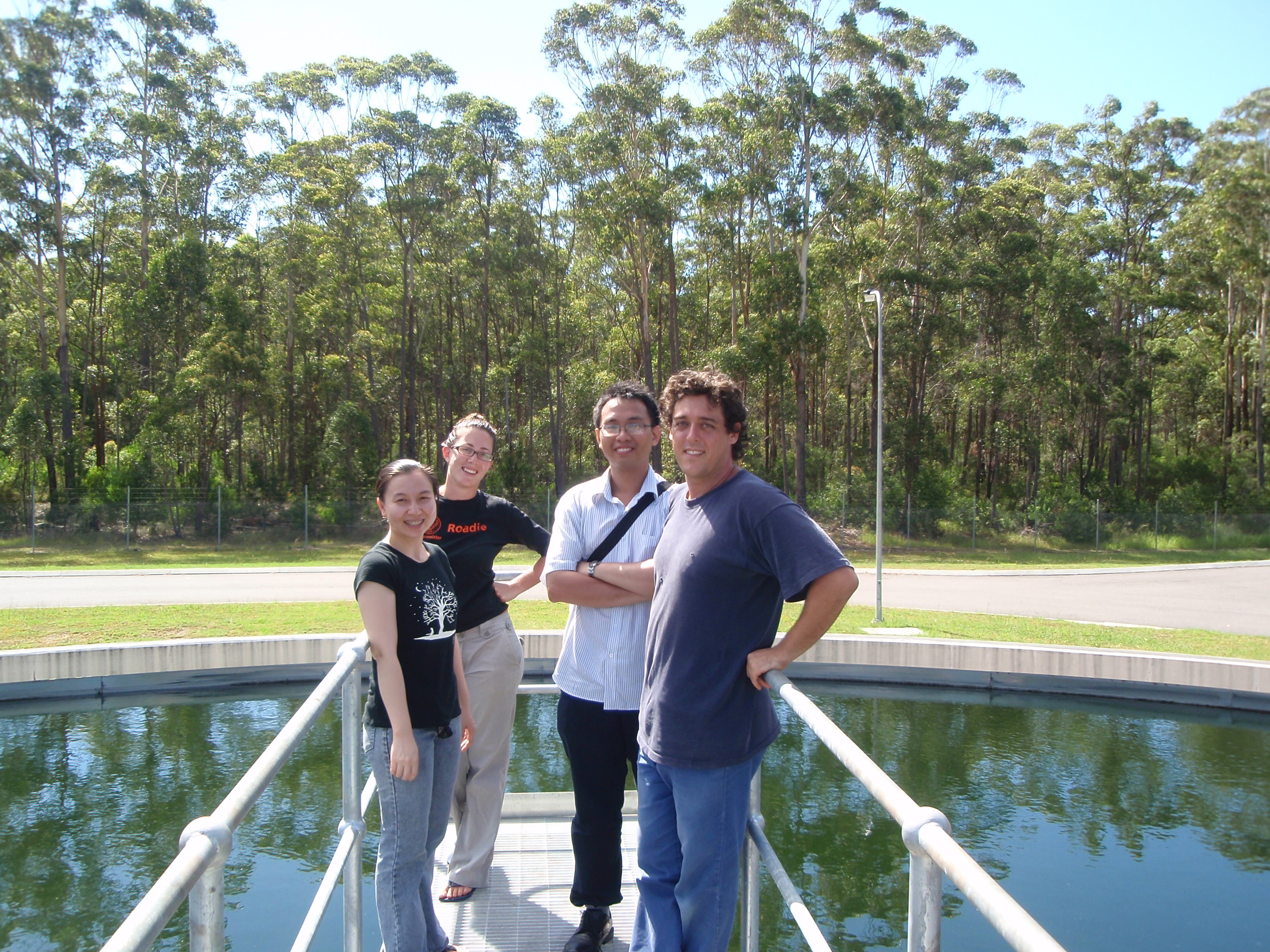 Professor Stuart Khan with his former PhD students at the Old Bar sewage treatment plant collecting samples to understand how some contaminants vary in concentration over a 24-hour period. 