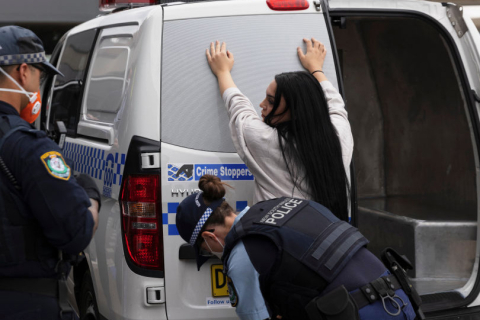 NSW Police search a young woman