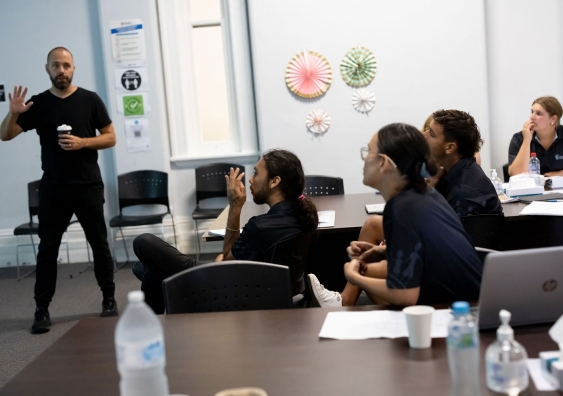 Dharawal language tutor teaching aboriginal students