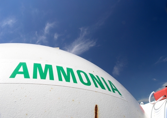 A tank of ammonia at a chemical plant with blue sky in background.