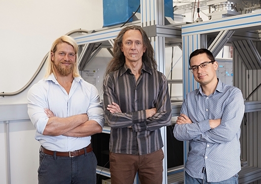 Dr Tim Botzem, Professor Andrea Morello and Dr Rostyslav Savytskyy in the quantum computing lab
