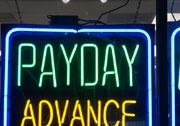 Payday advance sign inside