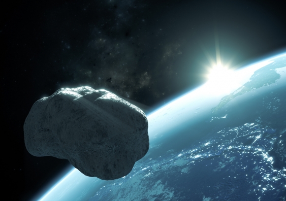 an illustration of an asteroid above earth