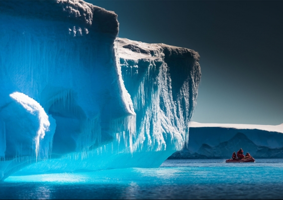 Scientists explore the Antarctic ocean by boat