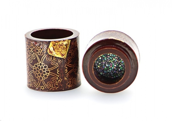 Art vessels showcasing floral motifs and jewelled inlay