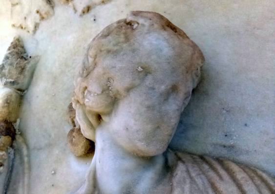 decaying marble statue