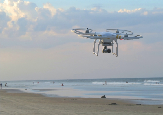 drone flying on the beach