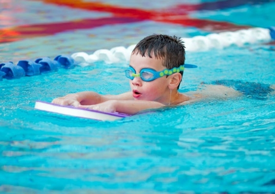 Young child swimming
