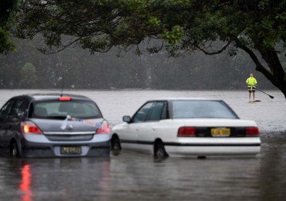 Two cars stranded in flood waters