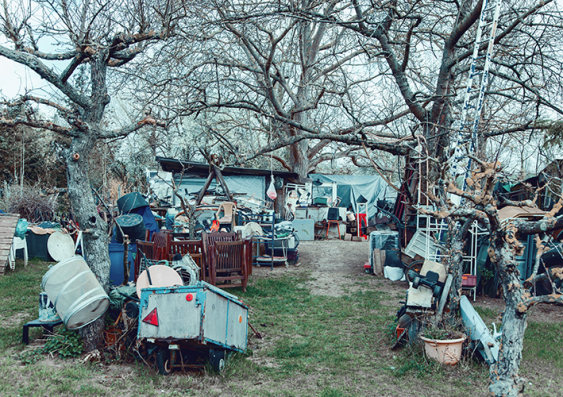 A yard crammed with junk