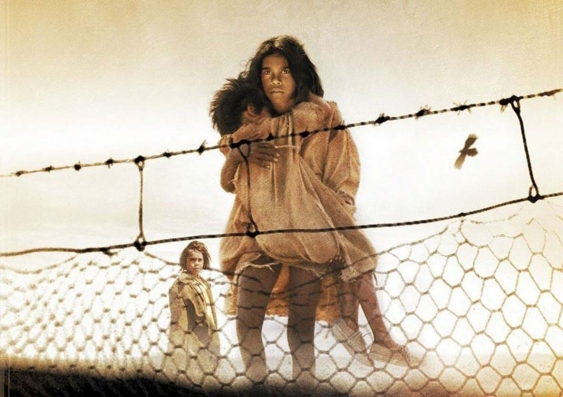 Three Aboriginal women walking along a rabbit proof fence - a promotional poster for the film