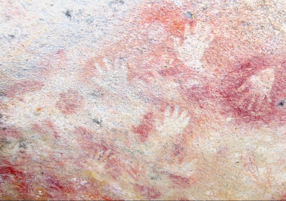 Handprints on sandstone