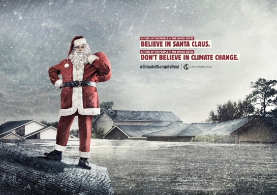 Santa Claus on rooftop surrounded by flooding with text comparing climate change belief