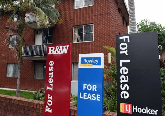 rental signs outside a block of units