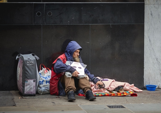 Homeless man on footpath