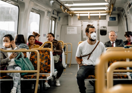 Commuters on a train in Melbourne wear a mask to protect themselves against COVID-19. 