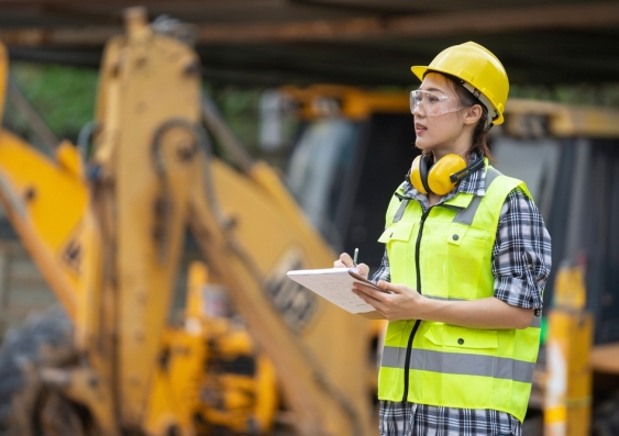 A asian girl construction engineer at construction site