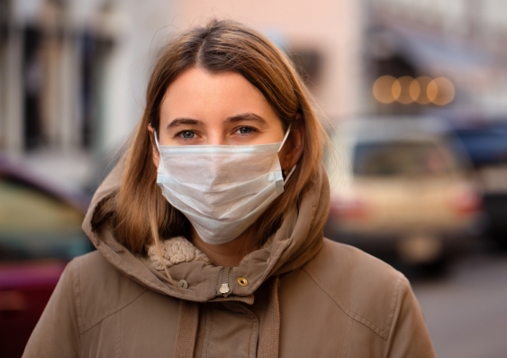 Girl wearing a surgical face mask