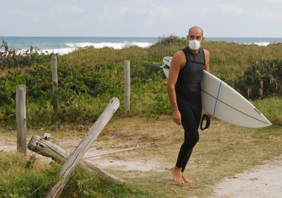 Surfer wearing a mask