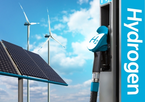 A composite image showing wind turbines and solar cells in the background, and a hydrogen fuel pump in the foreground
