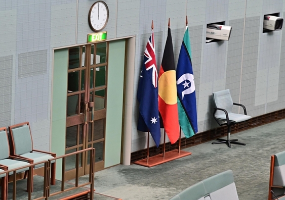 The Australian, the First Nations and Torres Strait Island flags in the House of Representatives at Parliament House