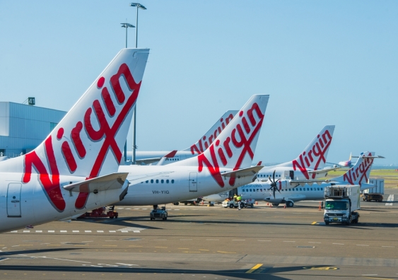 Businesses like Virgin Australia have offered a number of incentives for customers, in an attempt to speed up the vaccine rollout in Australia. Photo: Shutterstock