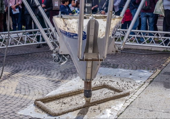 3D printer in action with cement