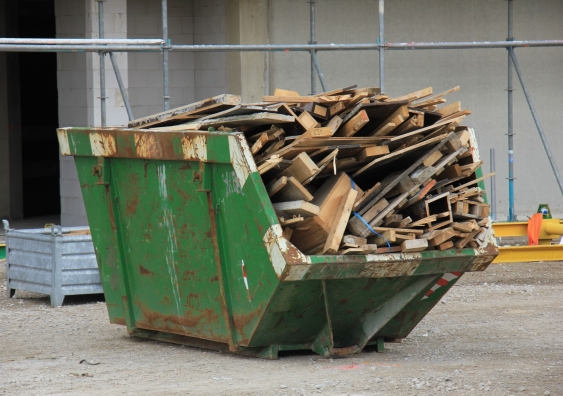 A skip bin filled with construction site refuse