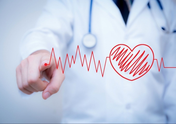 Doctor with stethoscope round their neck in background with artwork of heart monitor graph superimposed