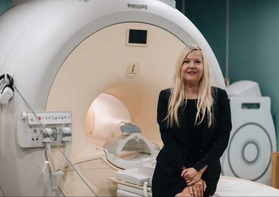 Sylvia Gustin and MRI machine