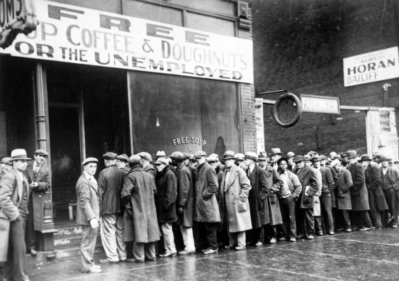 Unemployed men queued outside a soup kitchen during the Great Depression