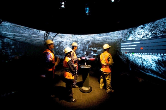 engineers using immersive simulation of an underground mine
