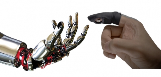 A new finger glove device on a human hand, contrasted with a robotic hand