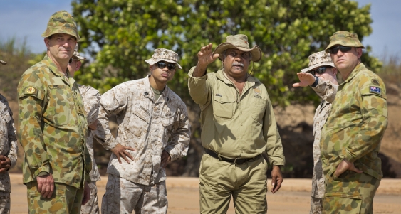 Larrakia Elder Eric Fejo (centre) advising Australian and US military personnel in the field