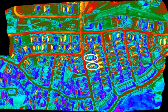 Heatmap showing temperature differences of dark roofs and cool roofs