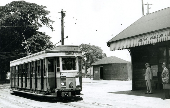 old_electric_tram_travelling_along_anzac_parade_towards_the_city_at_maroubra_junction.jpg