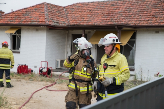 Firefighters attend a house fire