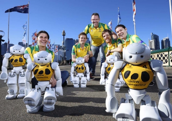 The UNSW RoboCup team and their players: Kenji Brameld, Hayden Smith, Brad Hall, David McKinnon and Peter Schmidt. Photo: Grant Turner/Mediakoo/UNSW.