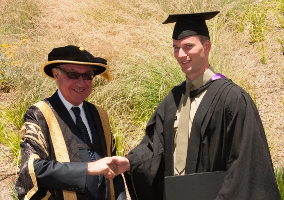 James Haw (right) with UNSW Chancellor David Gonski, at his graduation in 2013.