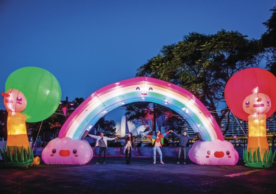 The installation 'Harmony Valley – Rainbow of Peace & Trees of Friendship' asks people to connect by holding hands. Photo: Destination NSW