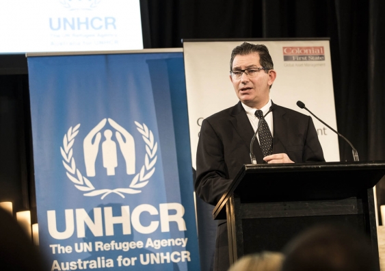 Professor Ian Jacobs gives the keynote speech to the Australia for UNHCR World Refugee Day Breakfast in Sydney. Photo: Ken Leanfore