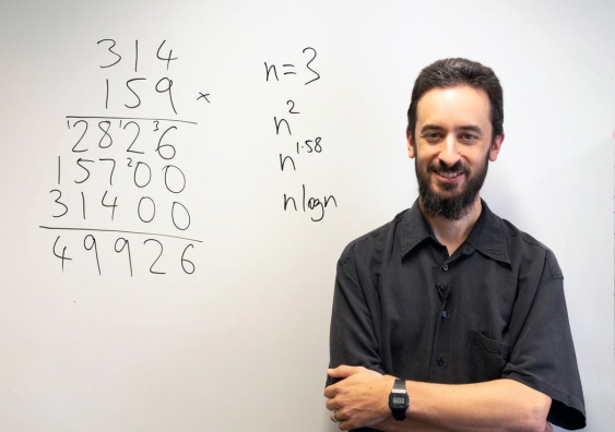A/Prof David Harvey demonstrates the traditional method of multiplication which is impractical when multiplying huge numbers. Picture: Natalie Choi