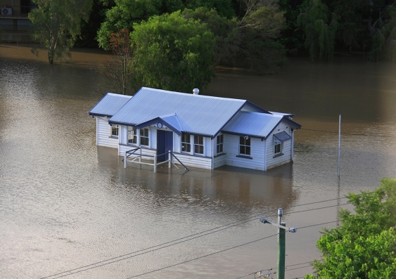 Extreme climate events: an old 'Queenslander' house in Milton, Brisbane during the floods in January, 2011. Picture: Shutterstock