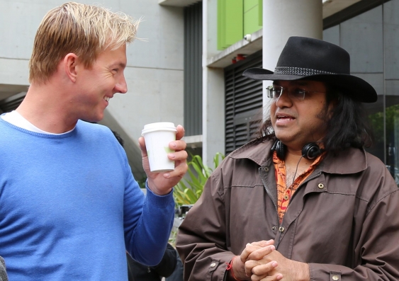 Brett Lee and producer and UNSW alumnus, Anupam Sharma, chat in between takes at UNSW. Photo credit: Leilah Schubert