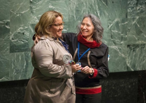 Megan Davis (left), newly-elected Chair of the Fourteenth Session of the UN Permanent Forum on Indigenous Issues, with the outgoing Chair Dalee Sambo Dorough.  (UN Photo/Loey Felipe)