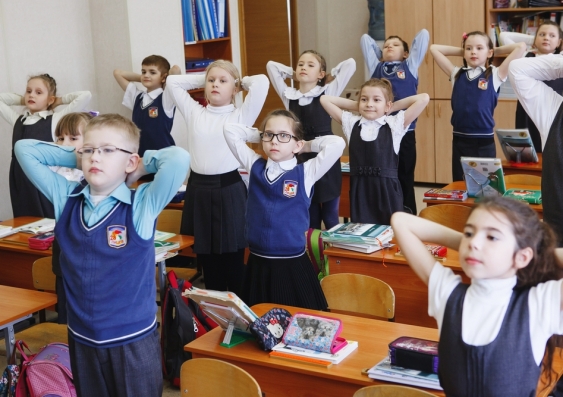 School children in Russia take a break from lessons for exercise. Photo: Shutterstock