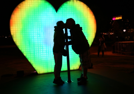 A couple declare their love at the I LOVE YOU installation designed by UNSW students. Photo: Leilah Schubert
