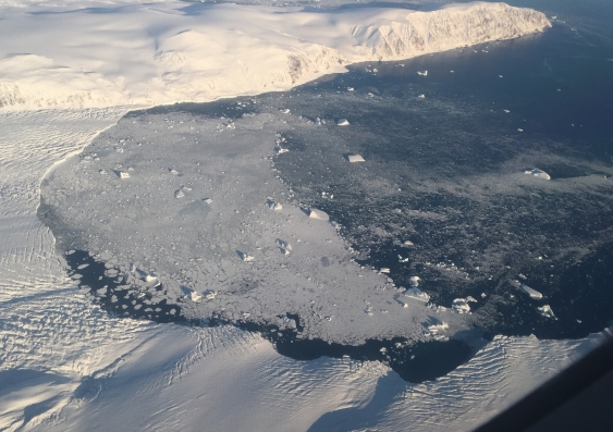 The front of a glacier melting into the ocean along the Greenland coast, seen from NASA's G-III aircraft during the fall 2016 Oceans Melting Greenland campaign. Image credit: NASA/JPL-Caltech